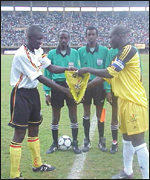 The captains shake hands before Saturday's game