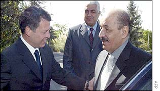 Jordan's King Abdullah (l) greets Iraqi Vice-President Taha Yassin Ramadan