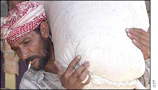 An Iraqi man stockpiles food 