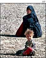 Afghan refugees at an Iranian border camp