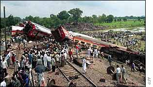 Rescue workers search the wreckage of the Rajdhani Express 