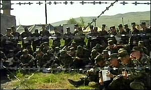 US and Georgian troops in camp