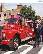 Firefighters bury one of their colleagues