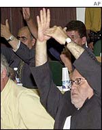 Palestinian parliamentary delegates including Saeb Erekat, foreground, wait to speak