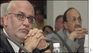 Saeb Erekat (left) and Tourism Minister Nabil Qassis