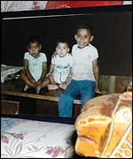 Three sons of Um Ahmad Srour who perished in the massacre