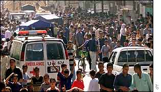 Scene outside blast-hit house