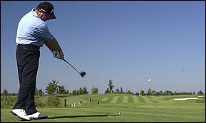 Welshman Ian Woosnam tees off at the seventh hole in Cologne