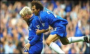 Gianfranco Zola embraces Eidhur Gudjohnsen after the opening goal