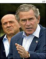 George W Bush (R) with Silvio Berlusconi
