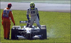 Schumacher climbs from his stricken Williams 