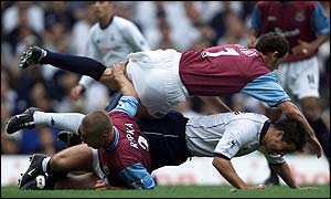 West Ham's Tomas Repka and Jamie Redknapp of Spurs clash