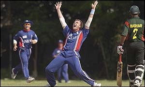 Dominic Cork celebrates in trademark style as he claims a wicket against Bangladesh