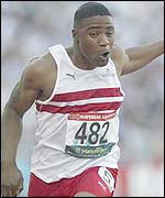 Mark Lewis-Francis dips for the line