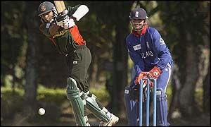 Bangladesh's Tushar Imran drives watched by England's emergency wicketkeeper Owais Shah