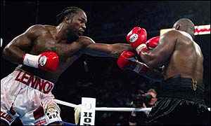 Lennox Lewis (left) beats Mike Tyson 