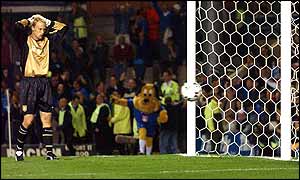 Aston Villa keeper Peter Enckelman makes a spectacular error