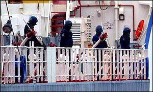Armed police on board the Pacific Pintail
