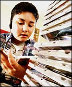 Teenager listening to music