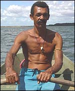 Marciano rowing to the island where he lives