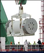 A cylinder containing Mox fuel is lifted from the Pacific Pintail