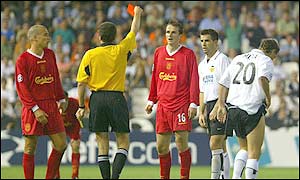 Hamann receives a red card for his second bookable offence