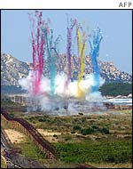 Smoke rises during ceremony