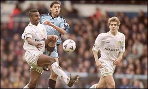 Lucasr Radebe (in white on the left) and team-mate Jonathan Woodgate (right)