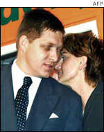 Robert Fico speaks with his deputy Monika Benova