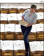 Election employee checking ballot boxes in Dresden