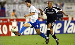 Hadjuk Split's Hrvoje Vejic clears the ball from Fulham's Steve Marlet 