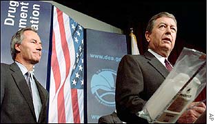 Asa Hutchinson and John Ashcroft with bottle of GHB