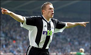 Craig Bellamy celebrates giving Newcastle the lead
