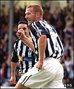 Lee Bullen celebrates his winning goal