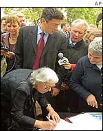 Lyudmila Alexeyeva, a human rights advocate, signs a petition against the restoration