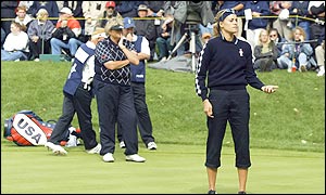 Europe's Paula Marti tosses her putter after a missed par putt on the 16th