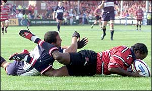 Teenage wing Marcel Garvey was in superb form once again, scoring a hat-trick to fire Gloucester to the top of the Zurich premiership 