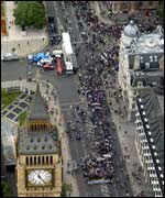 Marchers make their way along Whitehall