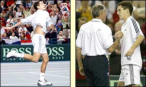 Henman celebrates by throwing his racket into the Birmingham crowd as captain Roger Taylor congratulates him on sealing Britain's place in the elite world group