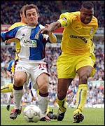 Blackburn's David Thompson (left) and Leeds Lucas Radebe