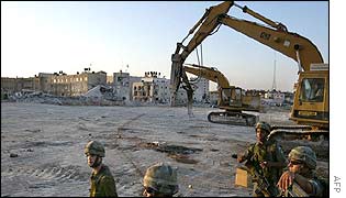 Israeli troops in the razed Ramallah compound