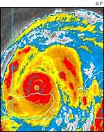 Satellite image of Isidore hitting Yucatan peninsula (outlined in white)