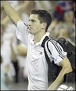 Tim Henman waves to the crowd