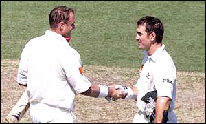 Justin Langer congratulates Matthew Hayden on a century