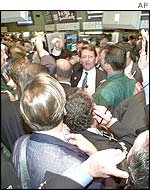 Traders trading Disney stock at the New York Stock Exchange