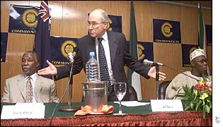 President Thabo Mbeki of South Africa, Prime Minister John Howard of Australia, and President Olusegun Obasanjo of Nigeria