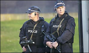Armed police guard the gates to the course as part of a huge security opeartion