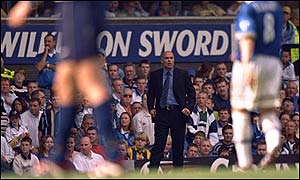 Christian Gross watches on at White Hart lane as his Spurs side take on Everton