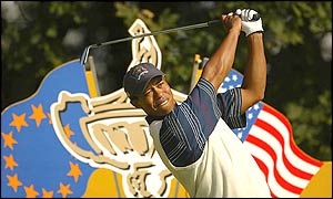 America's Tiger Woods plays off the 14th tee