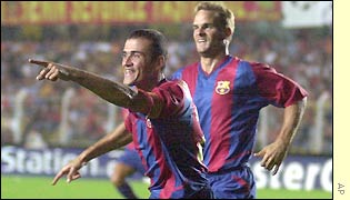 Luis Enrique celebrates his goal with Frank de Boer